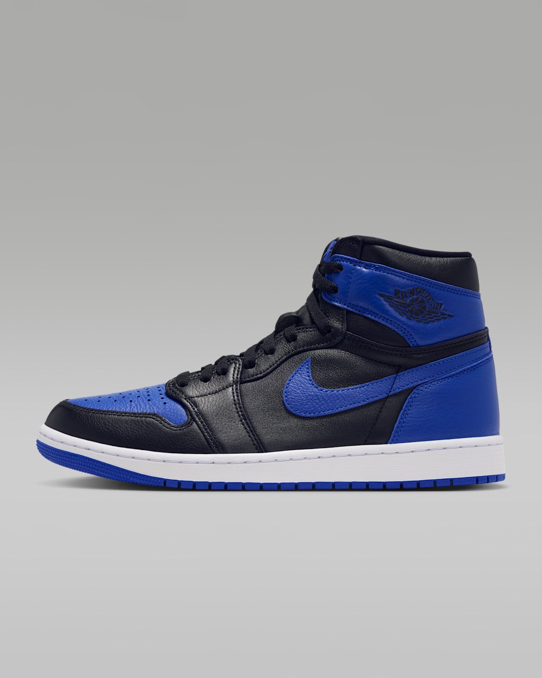 Air Jordan 1 High OG Royal, black and white leather upper with royal blue overlays.