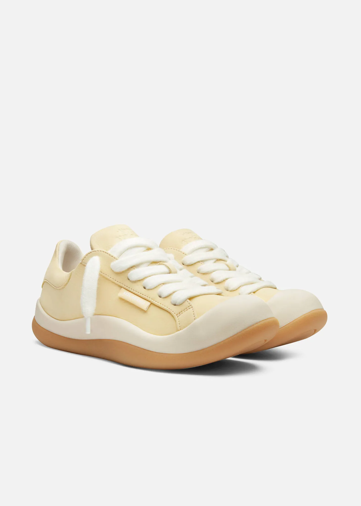 Axel Arigato Squish sneaker in yellow suede with gum sole