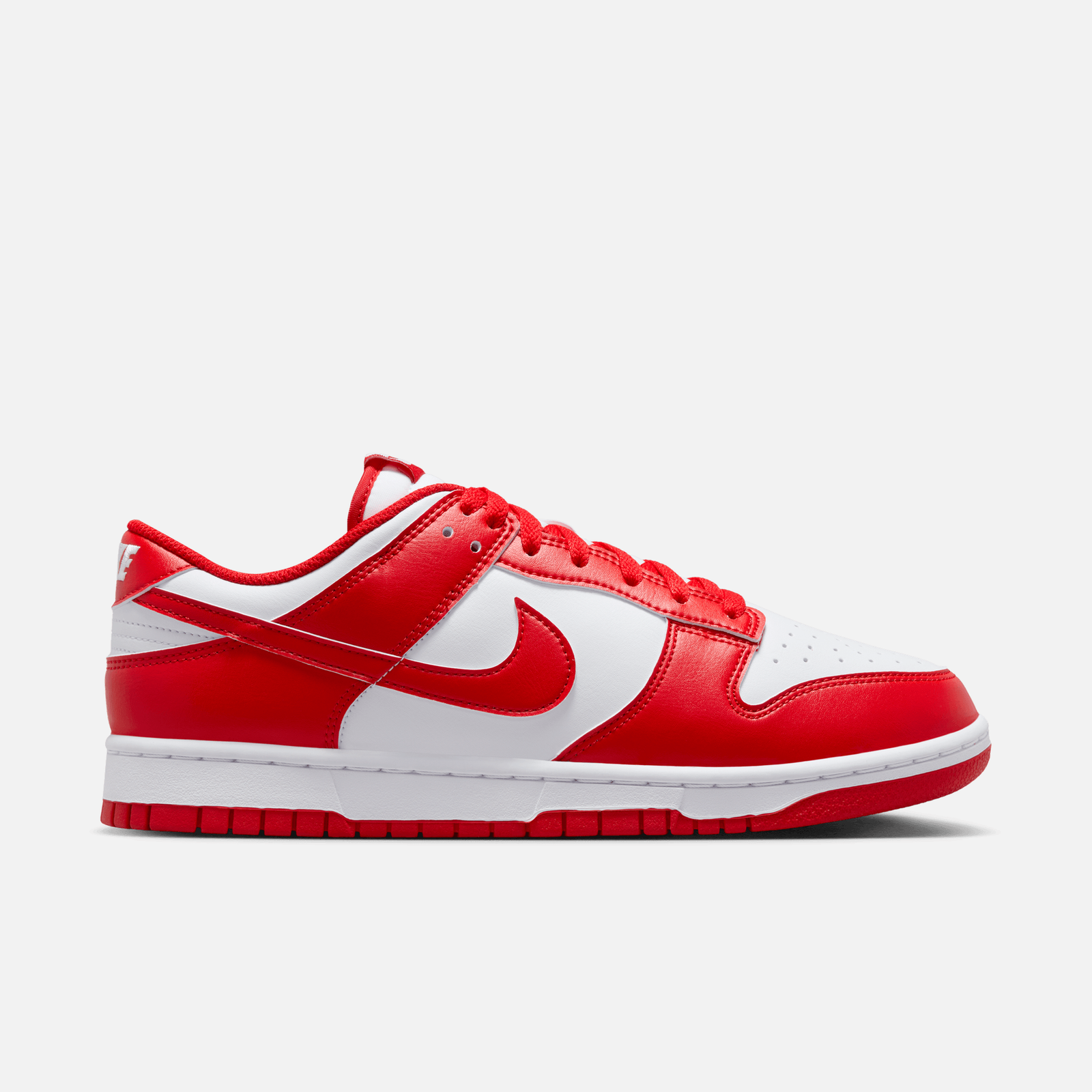 Nike Dunk Low St Johns, white leather base with bright University Red overlays and Swoosh, red outsole