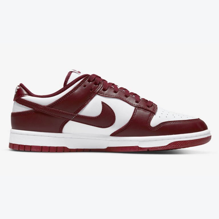 Nike Dunk Low Team Red, white leather base with deep red overlays and matching Swoosh, red outsole